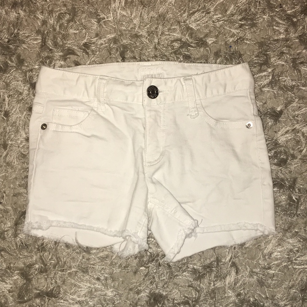 Girls size 12 white jean shorts.